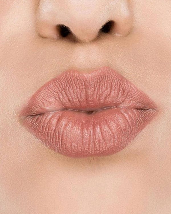 Raww - Coconut Kiss Lipstick in the shade of Angelic Almond with a closeup image applied to a woman's puckered lips