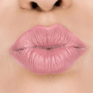 Raww - Coconut Kiss Lipstick in the shade of Poetic Pink with a closeup image applied to a woman's puckered lips