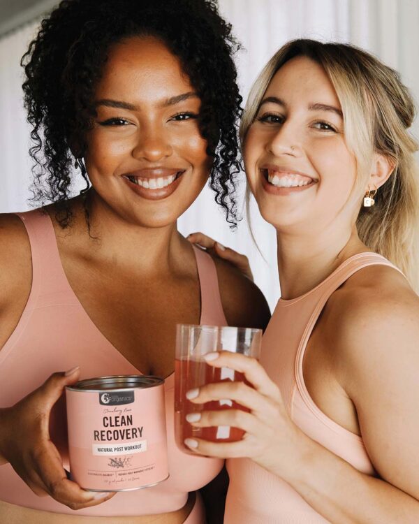 Two women holding Nutra Organics Clean Recovery products
